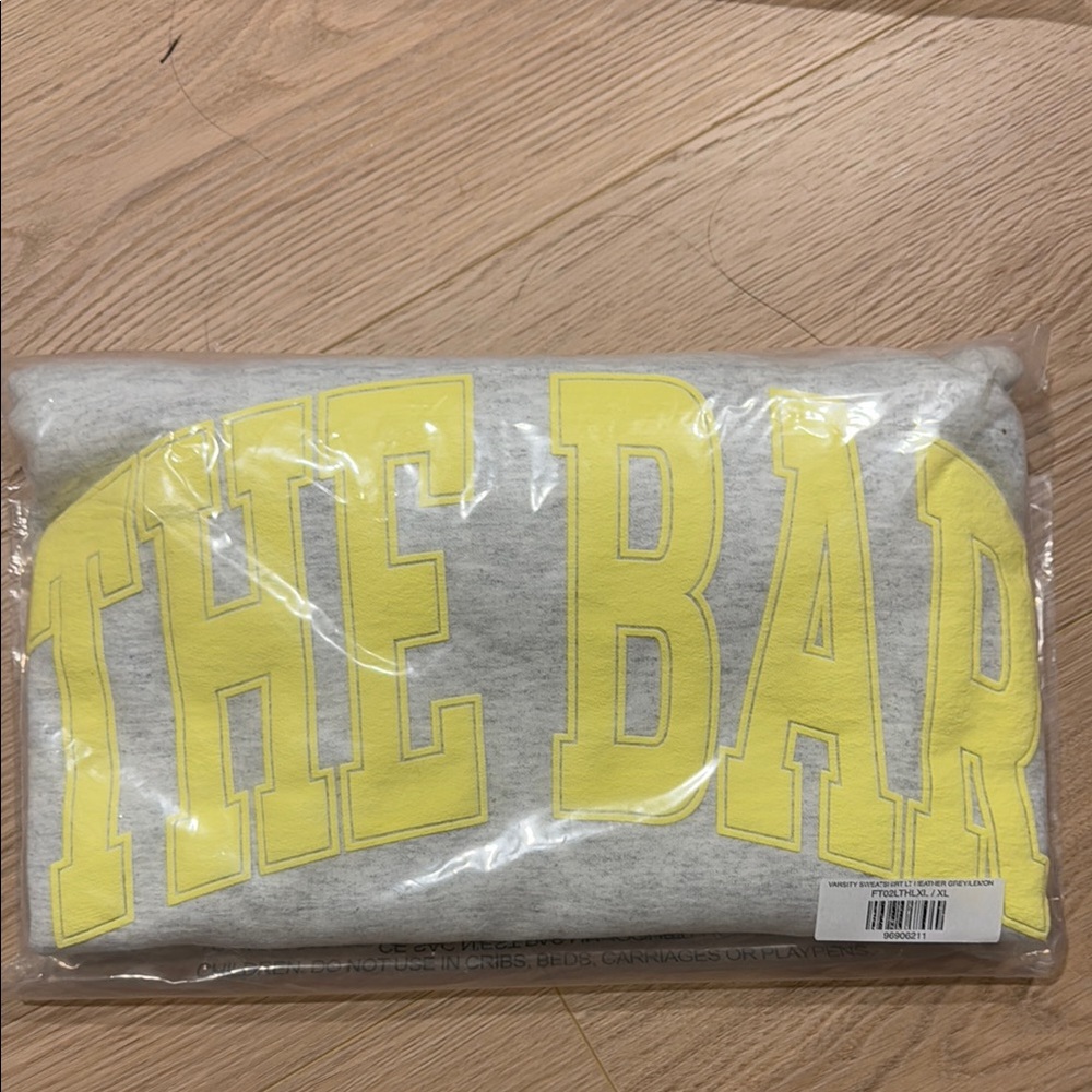Gray Sweatshirt with Yellow 'THE BAR' Print